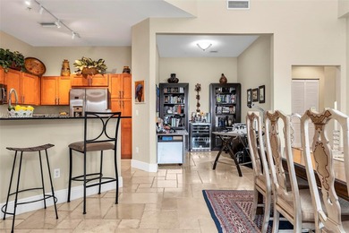 Discover this rare 2-bedroom, 2-bath plus den residence at The