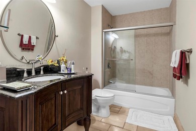 Discover this rare 2-bedroom, 2-bath plus den residence at The