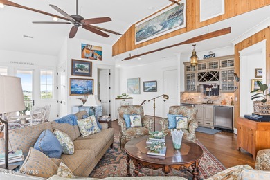 Sweeping views and golden marsh sunsets from this stunning 2014