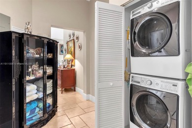 Discover this rare 2-bedroom, 2-bath plus den residence at The