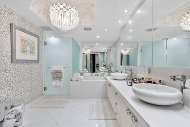 Experience South Florida luxury living in this CORNER NE