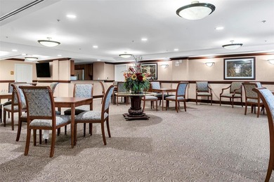 Discover this rare 2-bedroom, 2-bath plus den residence at The