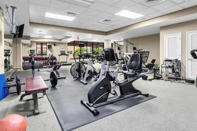 Discover this rare 2-bedroom, 2-bath plus den residence at The