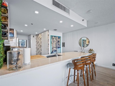 Stunning Corner Unit with Breathtaking Bay & Skyline Views

