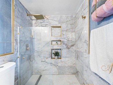 Stunning Corner Unit with Breathtaking Bay & Skyline Views

