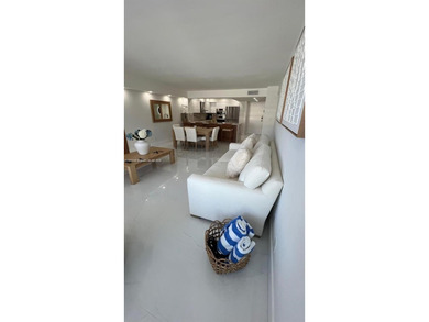 This stunning, fully remodeled apartment is the perfect blend of