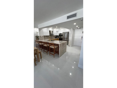 This stunning, fully remodeled apartment is the perfect blend of