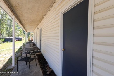 Creekside property with endless potential! This property comes