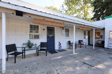 Creekside property with endless potential! This property comes