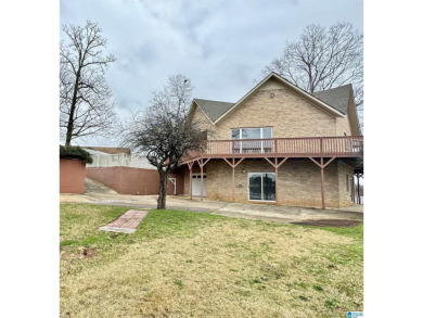 Escape to the beauty of lakefront living with this spacious