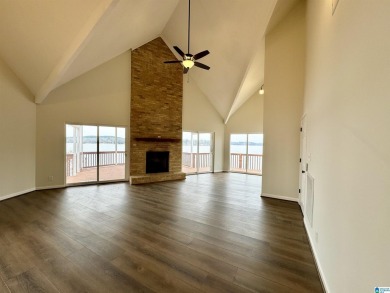 Escape to the beauty of lakefront living with this spacious
