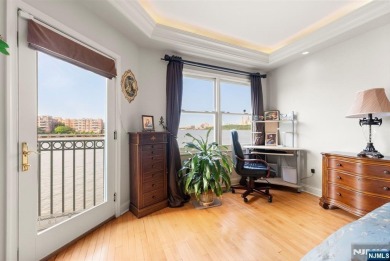 Experience the ultimate in waterfront living in this stunning