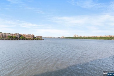 Experience the ultimate in waterfront living in this stunning