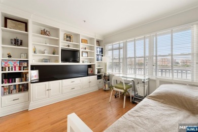 Experience the ultimate in waterfront living in this stunning