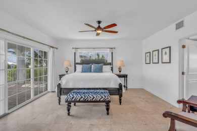 This beautiful home and adjacent lot are located on prestigious