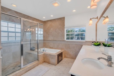 This beautiful home and adjacent lot are located on prestigious