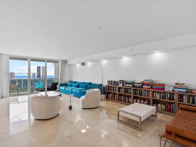 Commanding the skyline of Aventura, this Peninsula II penthouse