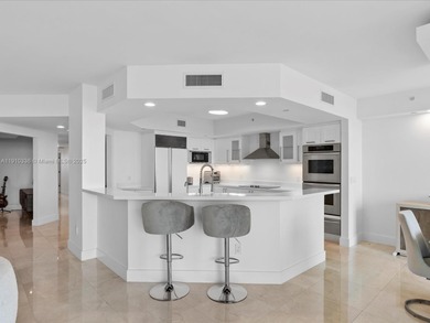 Commanding the skyline of Aventura, this Peninsula II penthouse