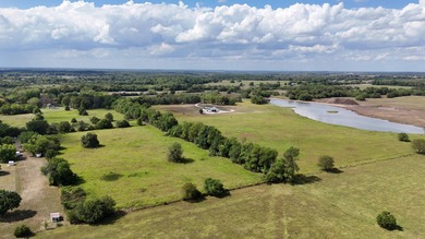 Charming Country Retreat with 11+ Acres and Development