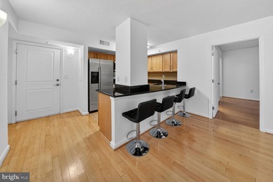 Step into this freshly painted, move-in ready condo featuring 2