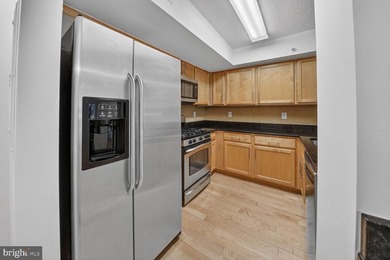 Step into this freshly painted, move-in ready condo featuring 2