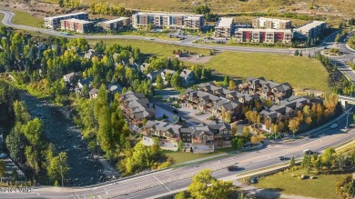 Introducing this meticulously crafted three-level townhome