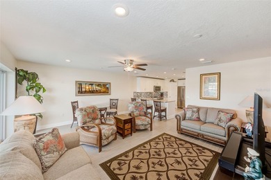 Stunning waterfront townhome just steps from the beach! Built in