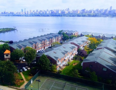 REDUCED!!! Over-sized 1045 sq ft home boasts new floors & a