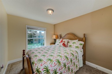 Stunning waterfront townhome just steps from the beach! Built in