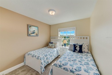 Stunning waterfront townhome just steps from the beach! Built in