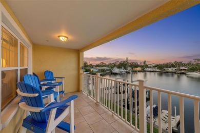 Stunning waterfront townhome just steps from the beach! Built in