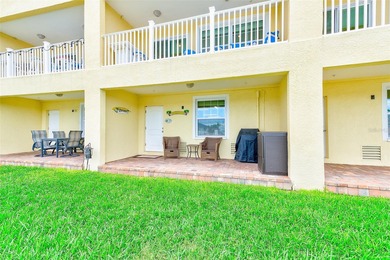 Stunning waterfront townhome just steps from the beach! Built in
