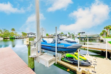 Stunning waterfront townhome just steps from the beach! Built in