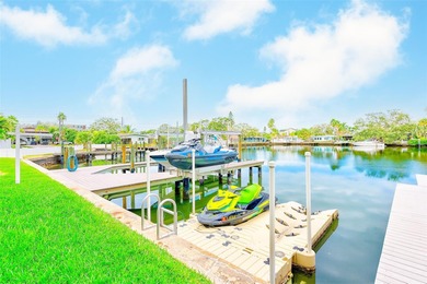 Stunning waterfront townhome just steps from the beach! Built in