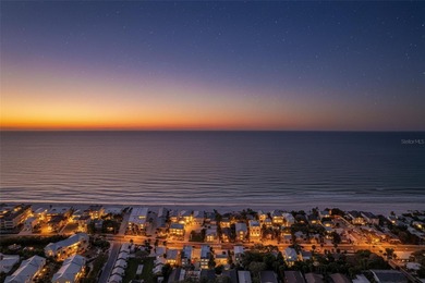 Stunning waterfront townhome just steps from the beach! Built in