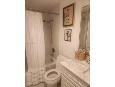 Beautiful and spacious updated 1 bedroom 1 1/2 bath  condo in a