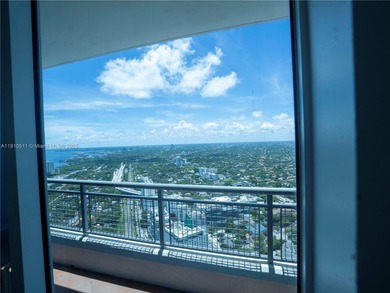 Experience luxury living high above the city in this stunning
