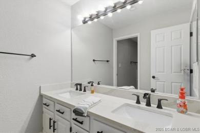 Enjoy the best of lake living in this beautifully remodeled