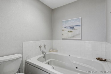 Enjoy the best of lake living in this beautifully remodeled