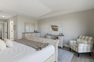 Enjoy the best of lake living in this beautifully remodeled