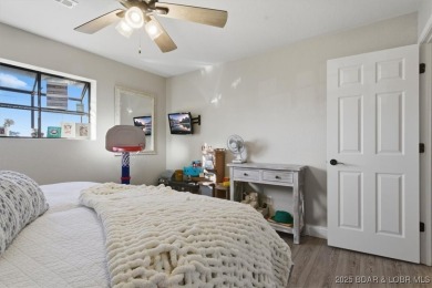 Enjoy the best of lake living in this beautifully remodeled