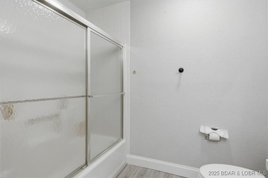 Enjoy the best of lake living in this beautifully remodeled