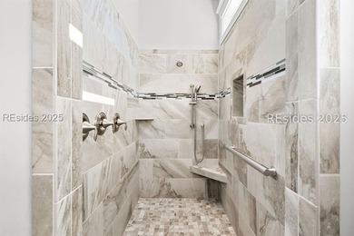 Lakefront meets Lowcountry at 312 Hampton Lake Drive. Here