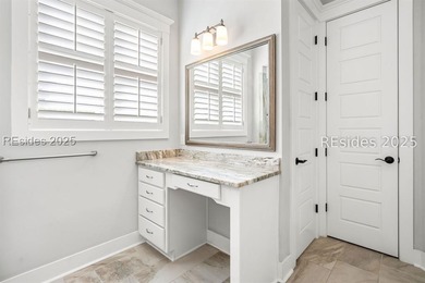 Lakefront meets Lowcountry at 312 Hampton Lake Drive. Here