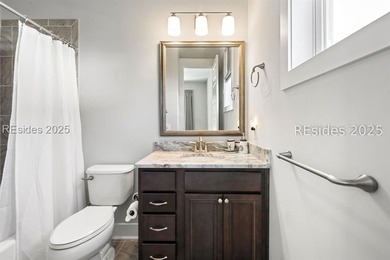 Lakefront meets Lowcountry at 312 Hampton Lake Drive. Here