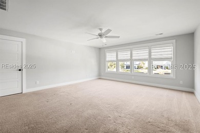 Lakefront meets Lowcountry at 312 Hampton Lake Drive. Here