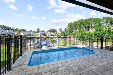 Lakefront meets Lowcountry at 312 Hampton Lake Drive. Here
