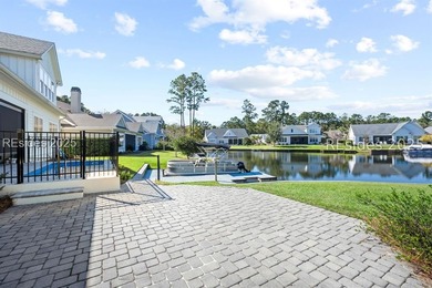 Lakefront meets Lowcountry at 312 Hampton Lake Drive. Here