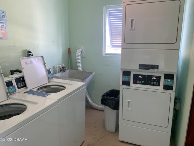 BEAUTIFUL RIVER FRONT UNIT OVERLOOKING THE CHART HOUSE MARINA