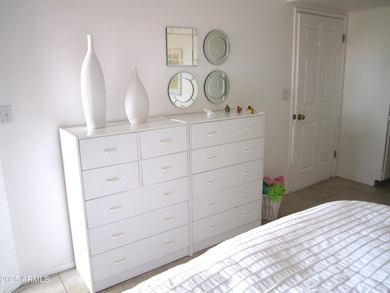 Step into this open and bright condo that blends warmth and